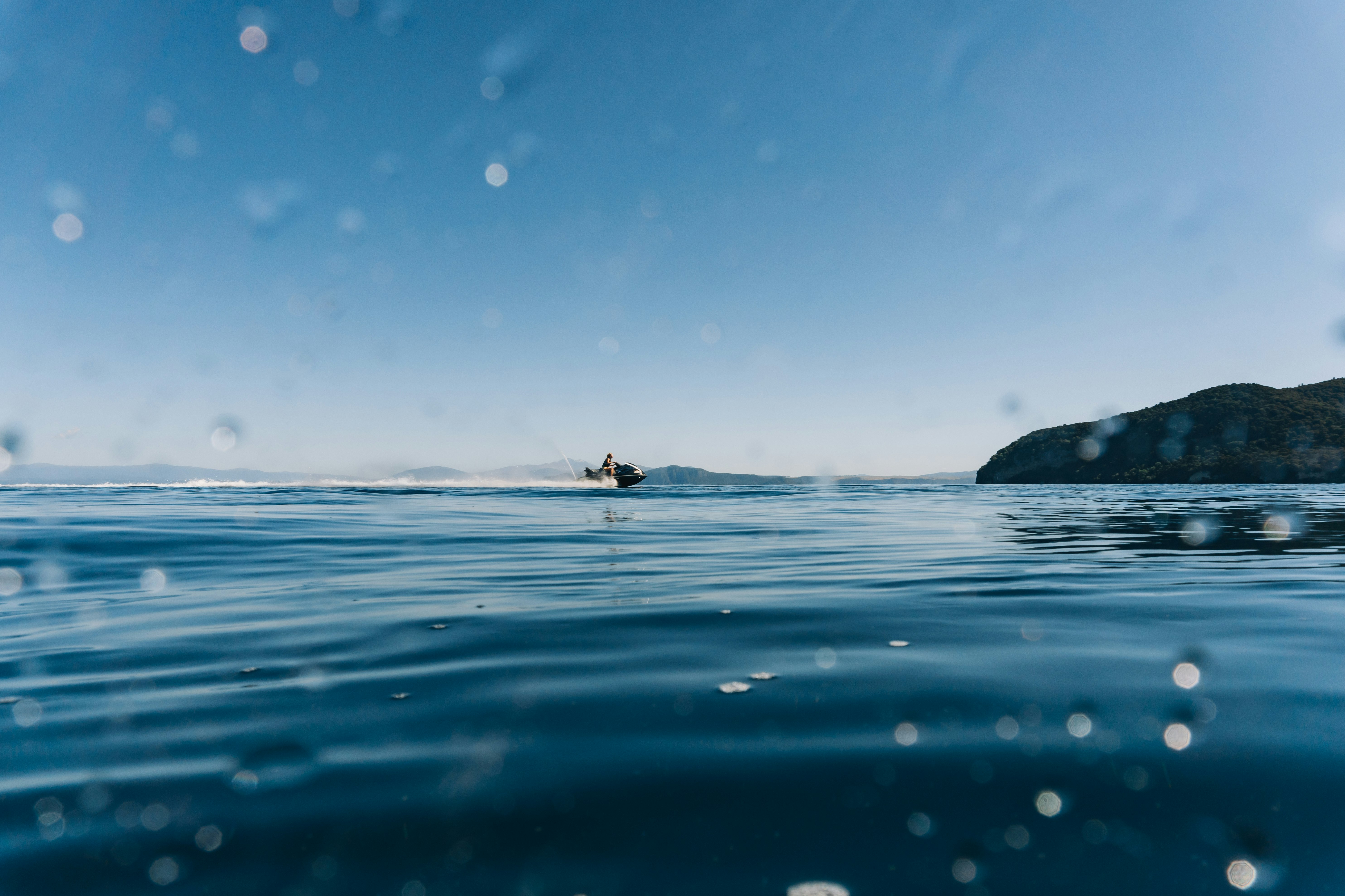 person surfing on sea during daytime